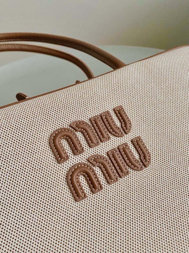 Miu Miu Beau canvas and leather bag 5BB163