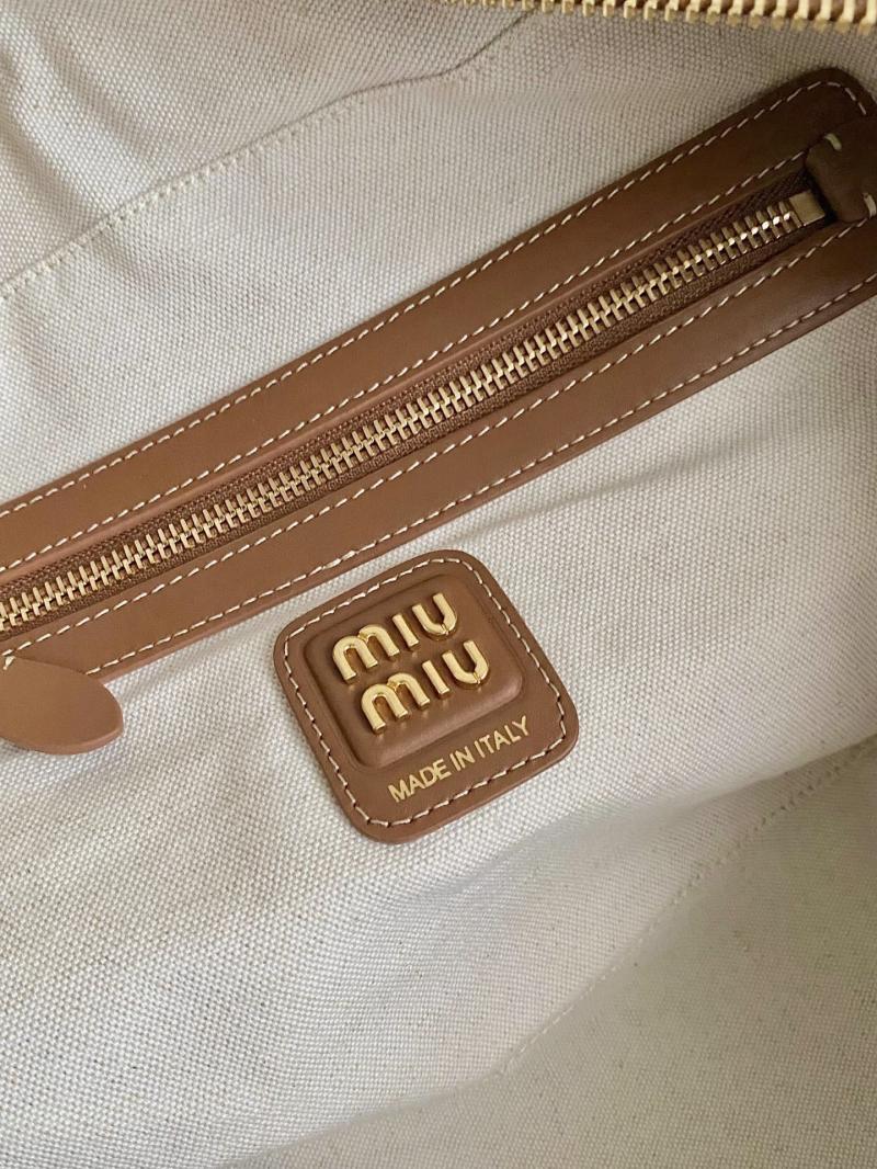 Miu Miu Beau canvas and leather bag 5BB163