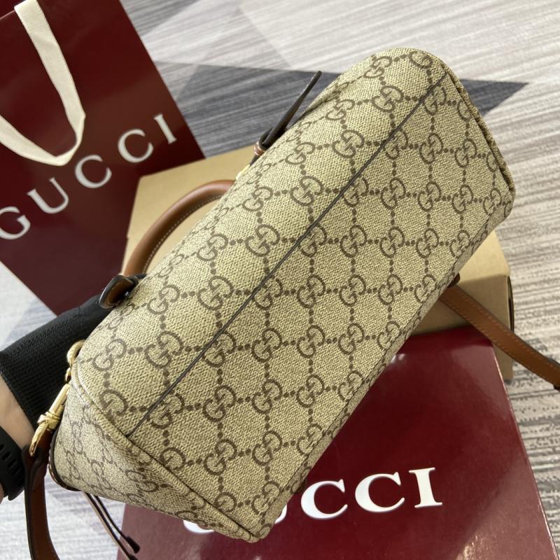 Gucci GG Emblem small top handle bag ‎839005