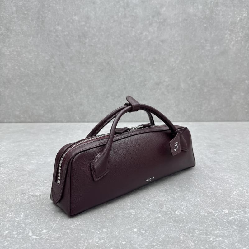 Alaia Le Teckel textured-leather Tote Burgundy AL4499