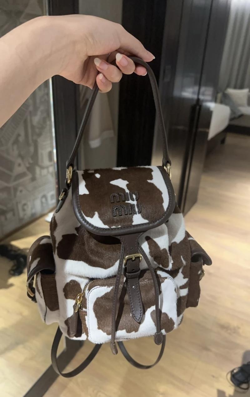 Miu Miu Printed leather backpack 5BZ043