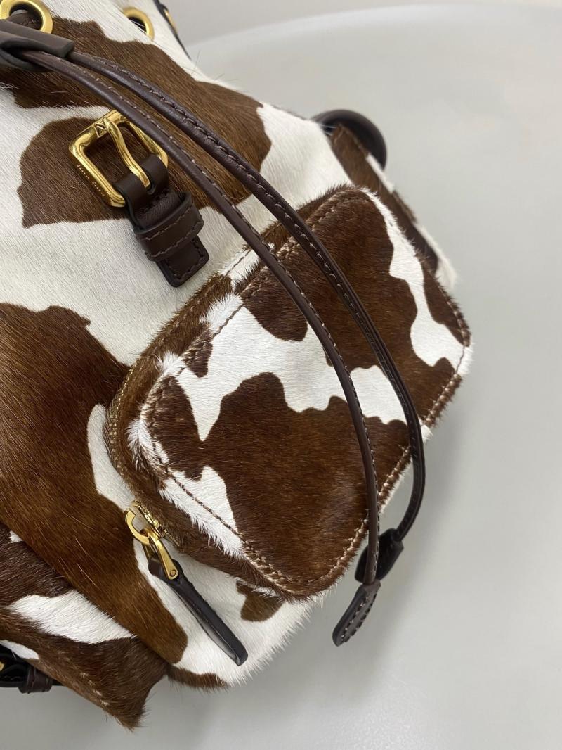 Miu Miu Printed leather backpack 5BZ043